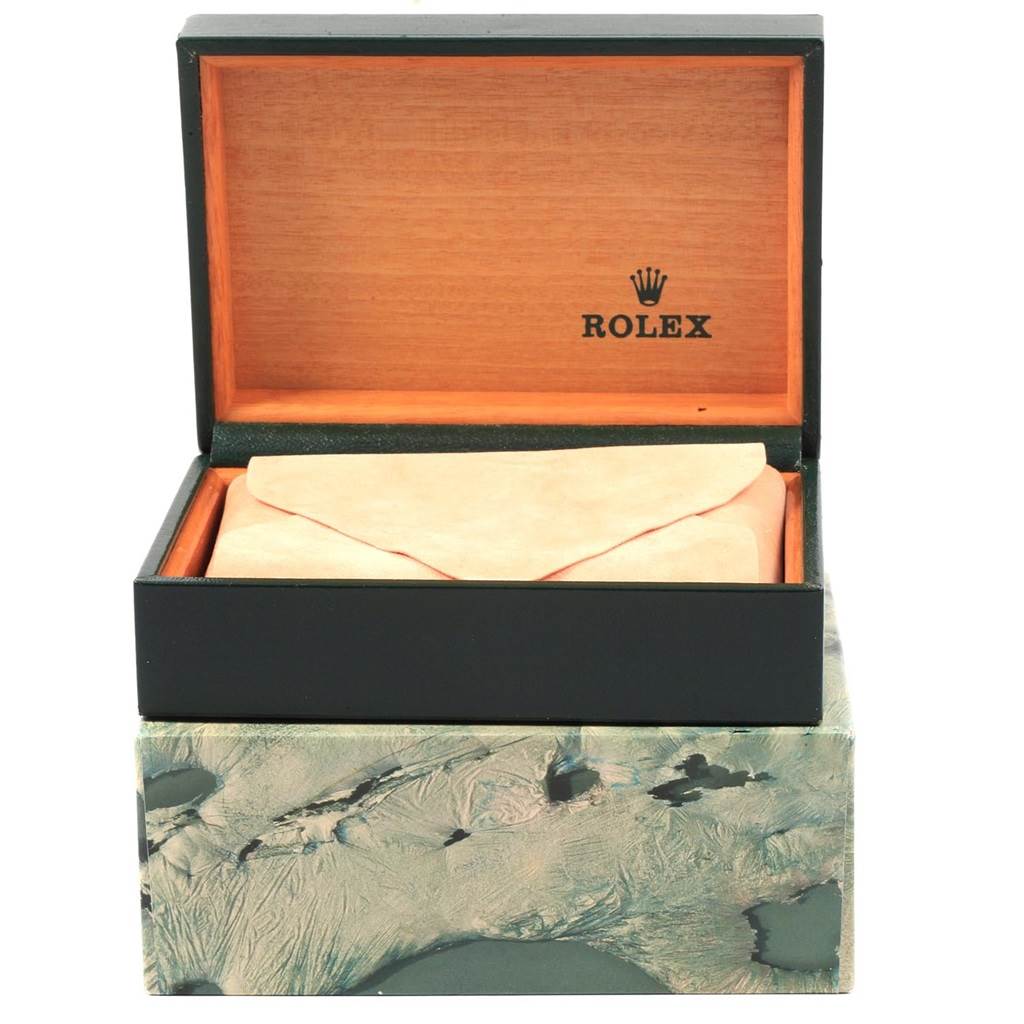 This image shows a Rolex Mid-Size 68274 Women's Stainless Steel Blue Dial 68274 Women's Stainless Steel Blue Dial watch in its open wooden presentation box from a front angle.