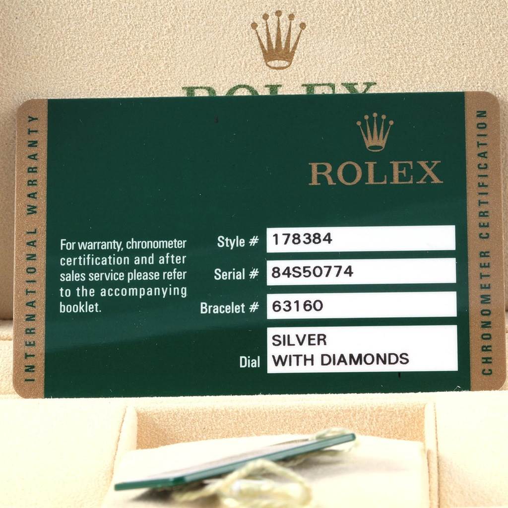 The image shows the warranty card for a Mid-Size Rolex watch, detailing the style, serial, bracelet number, and dial type.