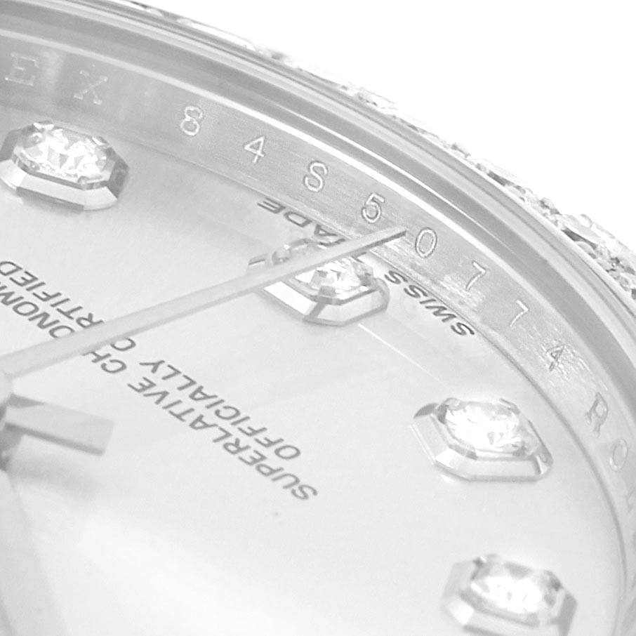 This close-up image shows the dial, diamond markers, and part of the minute hand of a Rolex Mid-Size 178384 Women's Stainless Steel Silver Dial 178384 Women's Stainless Steel Silver Dial model.