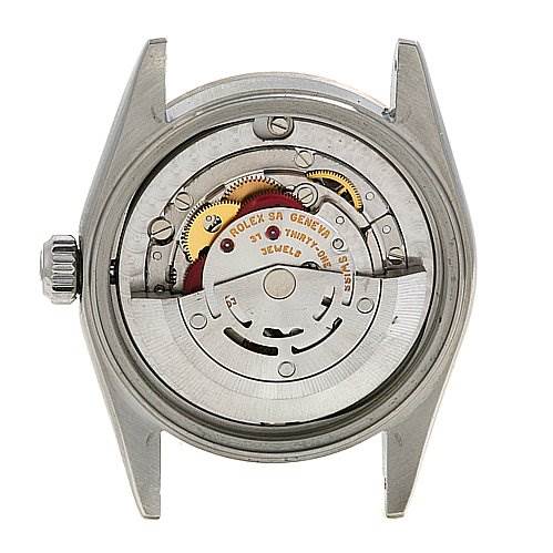 This is a rear view of a Rolex Mid-Size 78274 Women's Stainless Steel Pink Dial 78274 Women's Stainless Steel Pink Dial model showing its inner watch mechanism.