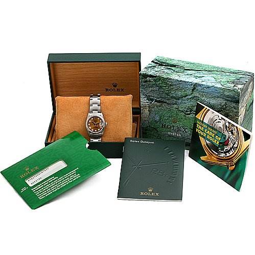 The image shows a Rolex Mid-Size 78274 Women's Stainless Steel Pink Dial 78274 Women's Stainless Steel Pink Dial watch in its open box, with additional packaging and booklets displayed around it.