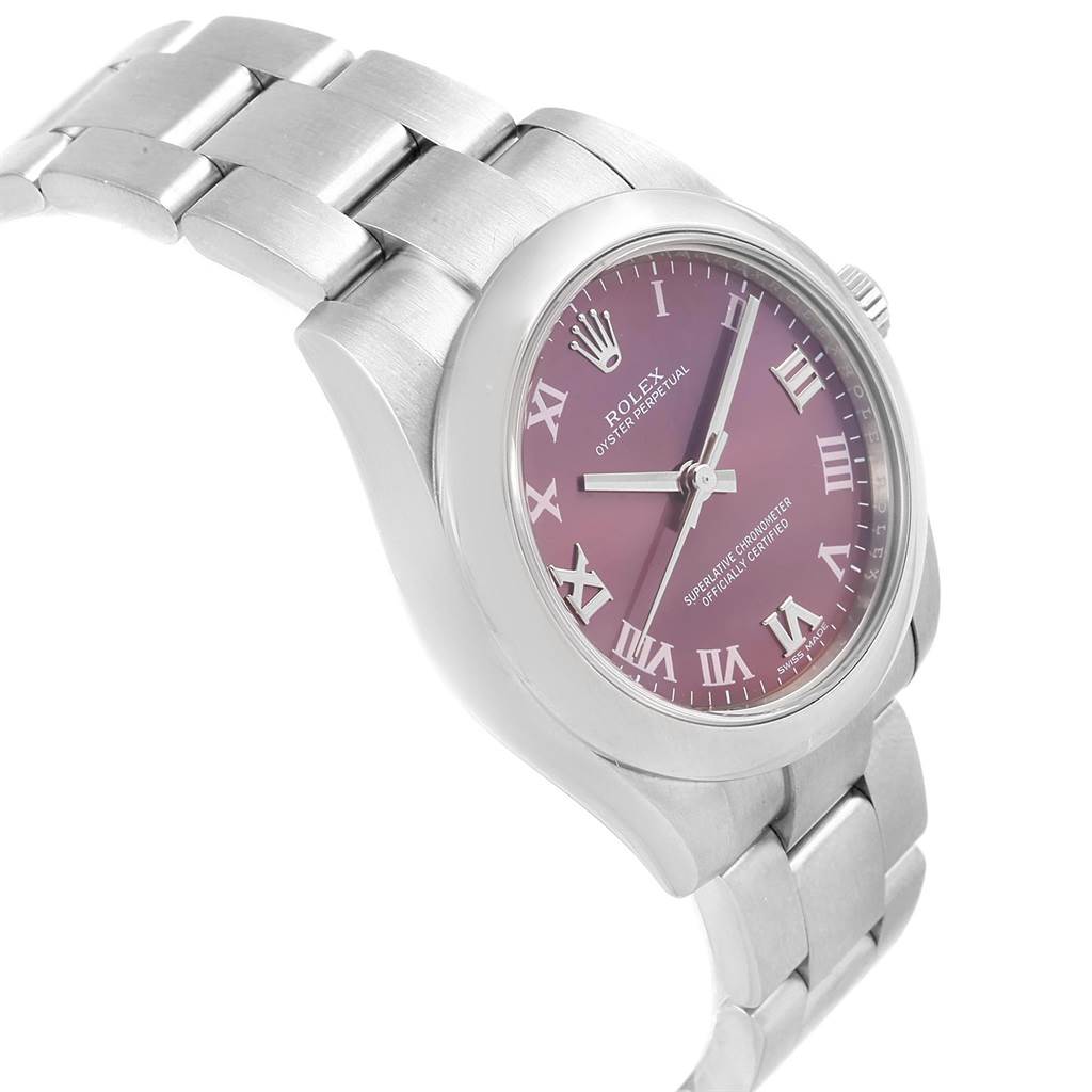 The image shows a side angle of a Rolex Mid-Size 177200 Women's Stainless Steel Burgundy Dial 177200 Women's Stainless Steel Burgundy Dial model watch featuring its pink dial, bezel, and part of the bracelet.