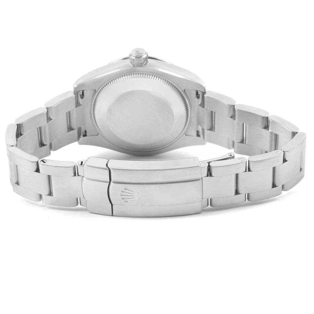 The Rolex Mid-Size 177200 Women's Stainless Steel Burgundy Dial 177200 Women's Stainless Steel Burgundy Dial model watch is shown from the back, highlighting the case back and bracelet clasp.