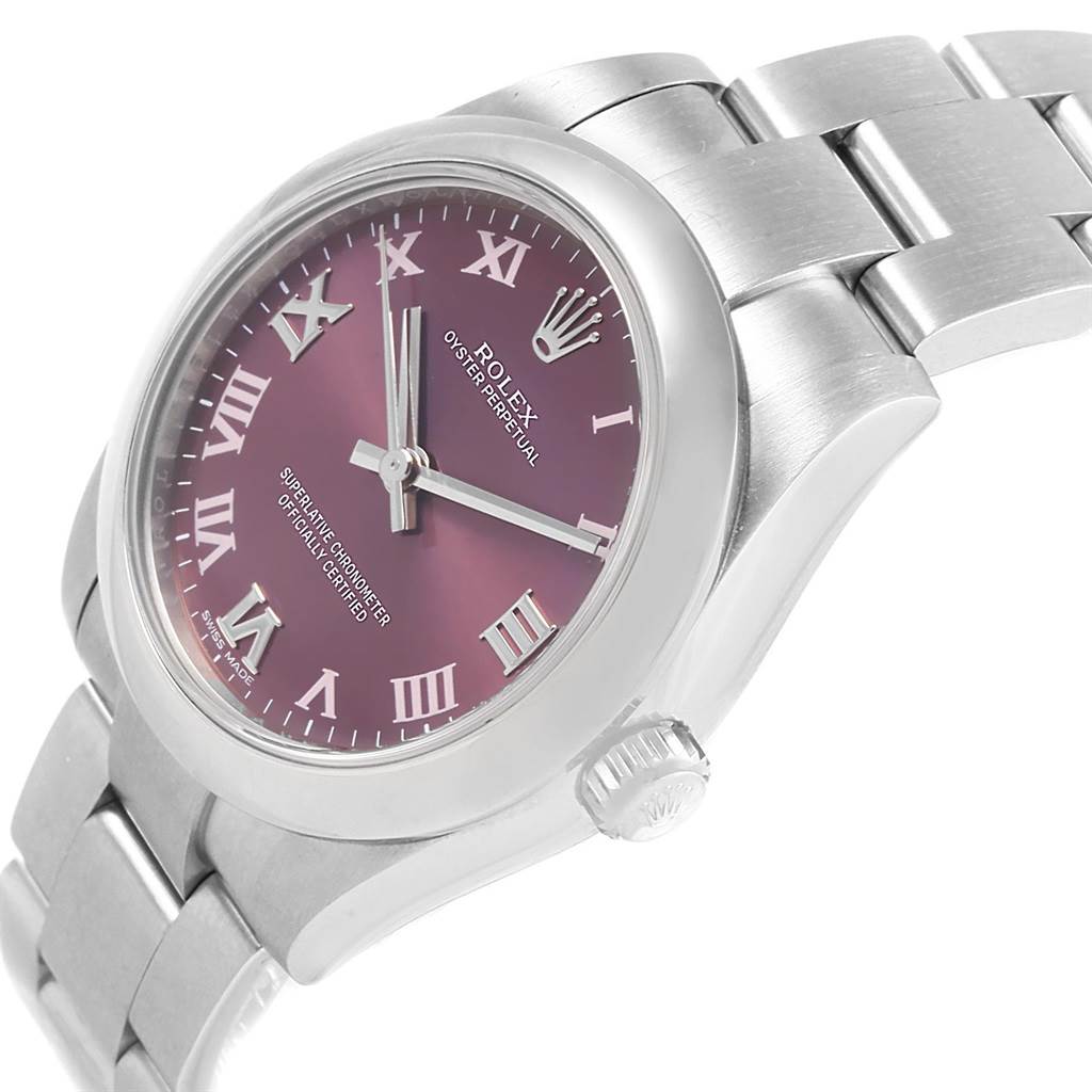 The image shows a side-angle view of a Mid-Size Rolex watch displaying its bracelet, crown, and purple dial with Roman numerals.