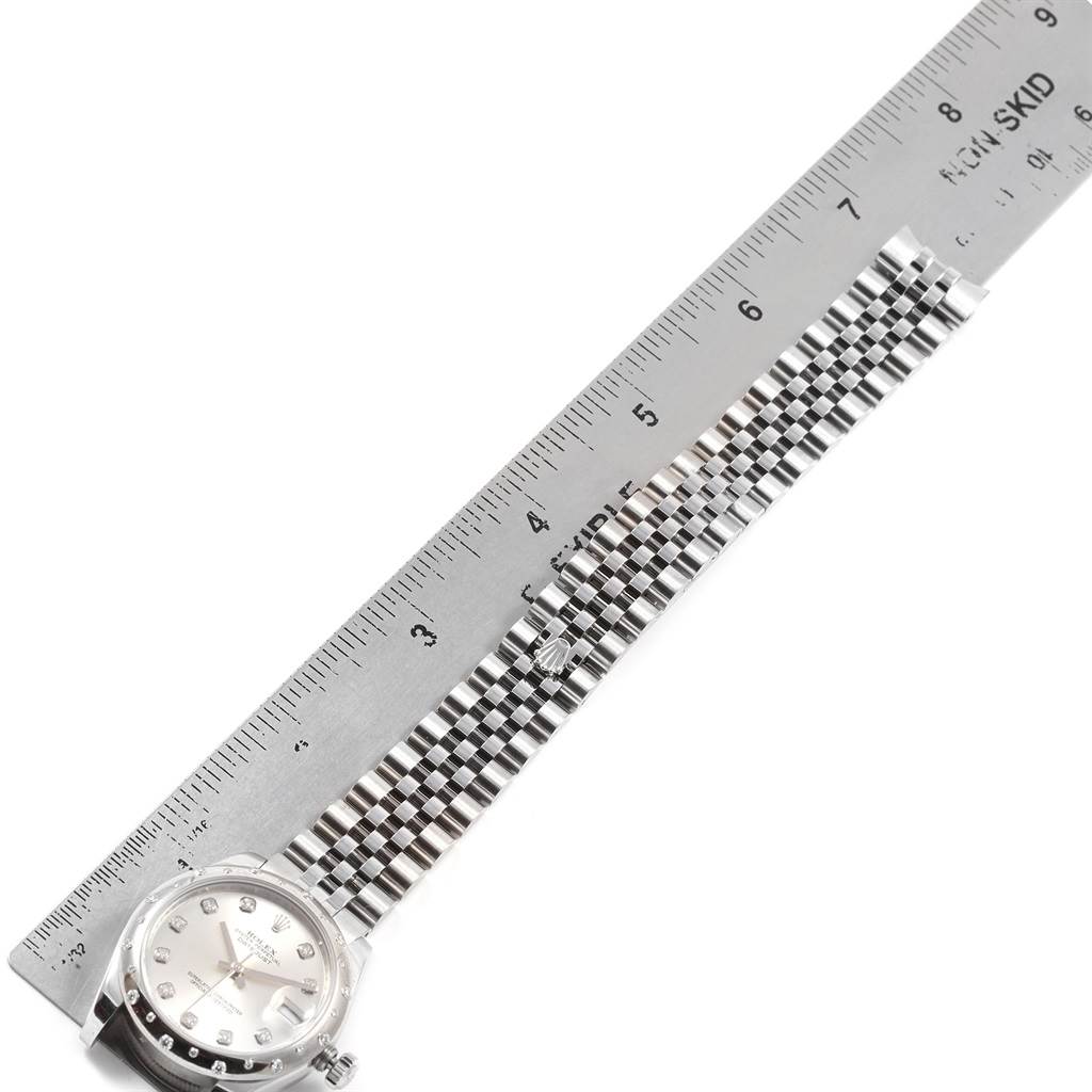 The image shows the Rolex Mid-Size 178344 Women's Stainless Steel Silver Dial 178344 Women's Stainless Steel Silver Dial watch at a slight angle, highlighting the watch face and bracelet with a ruler beside it for scale.