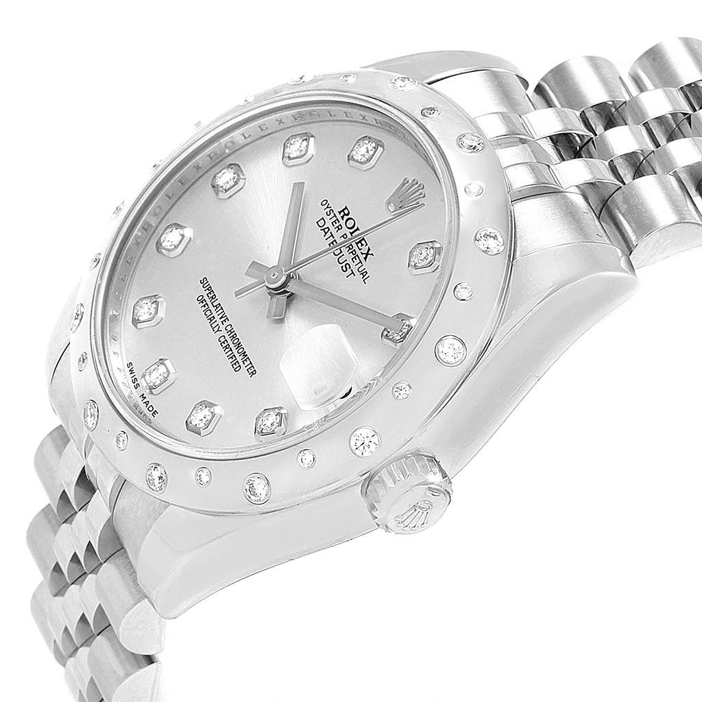 The image shows the side view of a Rolex Mid-Size 178344 Women's Stainless Steel Silver Dial 178344 Women's Stainless Steel Silver Dial model, focusing on its diamond-studded bezel, dial, and bracelet.