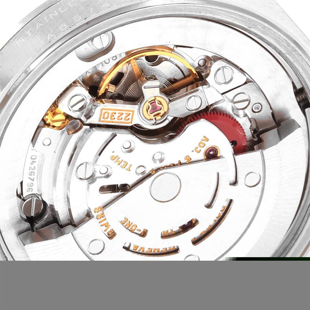 This image shows the intricate internal movement mechanism of a Rolex Mid-Size 77080 Women's Stainless Steel Black Dial 77080 Women's Stainless Steel Black Dial model watch viewed from the back.