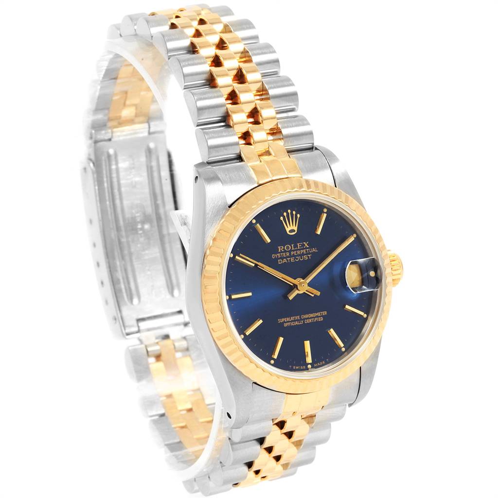 The image shows a Rolex Mid-Size 68273 Women's Steel and Gold (two tone) Blue Dial 68273 Women's Steel and Gold (two tone) Blue Dial Oyster Perpetual Datejust watch at a three-quarter angle, highlighting the bracelet, bezel, and dial.