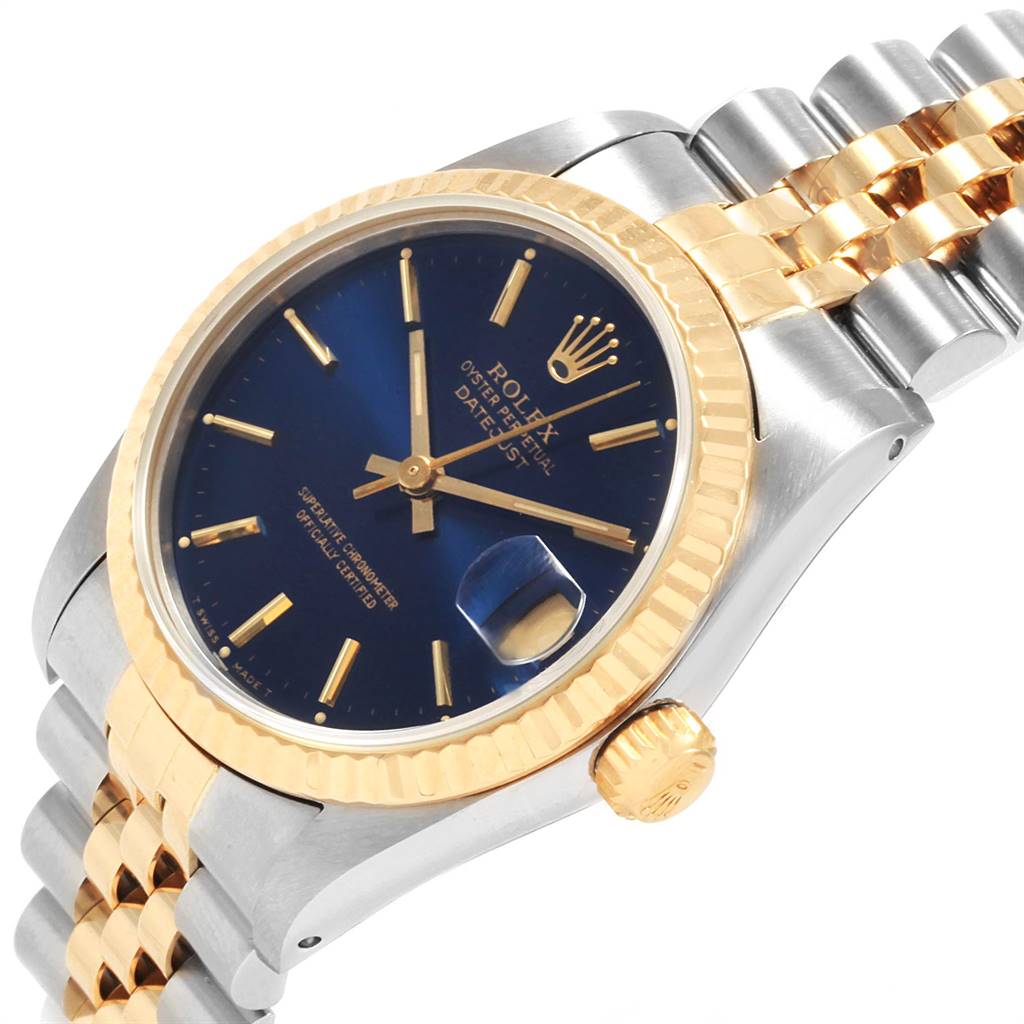 This Mid-Size Rolex watch is displayed at an angle showing the face, crown, and part of the jubilee bracelet.