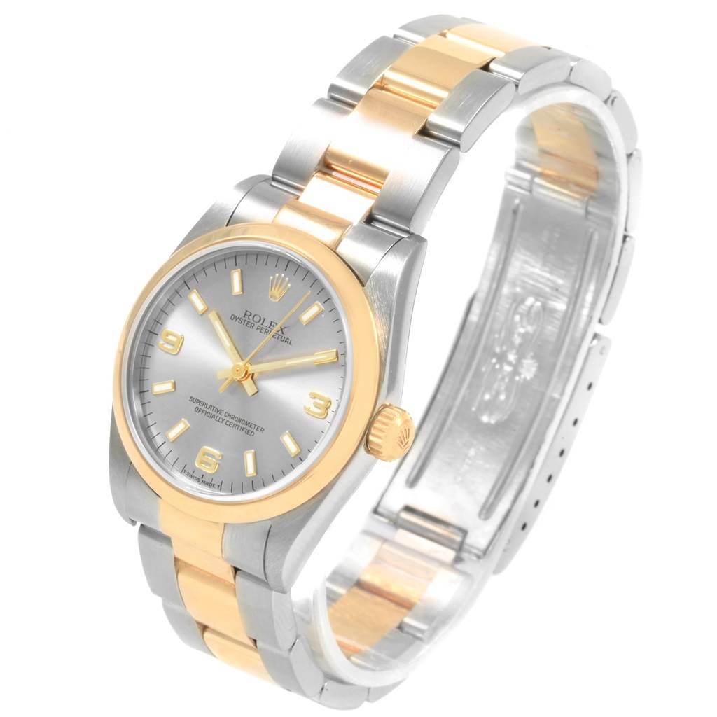 This image shows a Rolex Mid-Size 77483 Women's Steel and Gold (two tone) Grey Dial 77483 Women's Steel and Gold (two tone) Grey Dial watch at a three-quarter angle, highlighting the face, bezel, and two-tone bracelet.