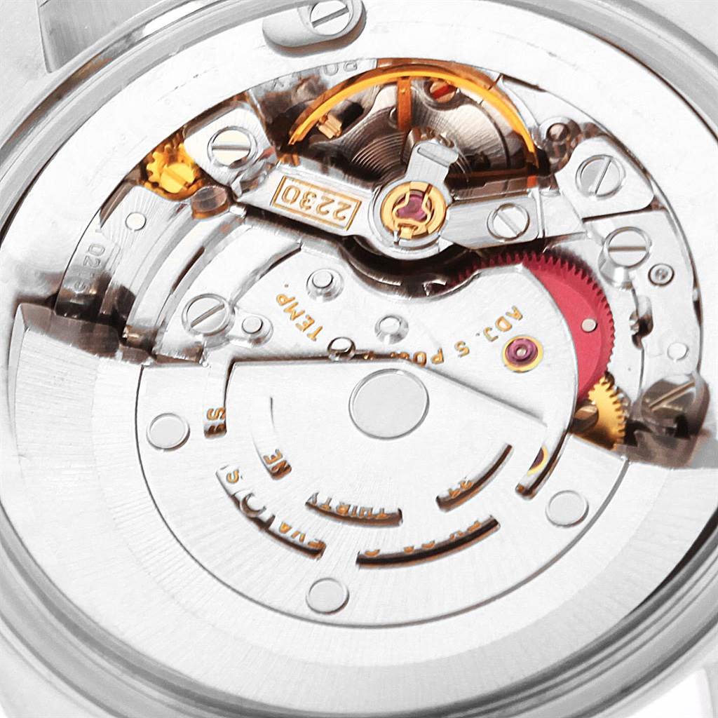 This image shows the inner mechanical movement parts of a Rolex Mid-Size 77080 Women's Stainless Steel Silver Dial 77080 Women's Stainless Steel Silver Dial model watch at a close-up angle.