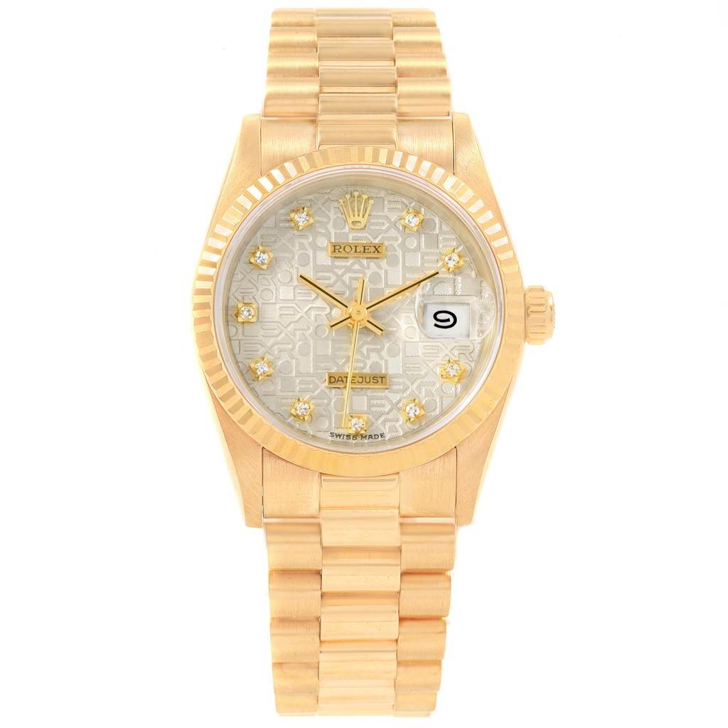 The image shows a Rolex Mid-Size 68278 Women's Yellow Gold Silver Dial 68278 Women's Yellow Gold Silver Dial Day-Date watch from a front angle, displaying its gold bracelet and dial.