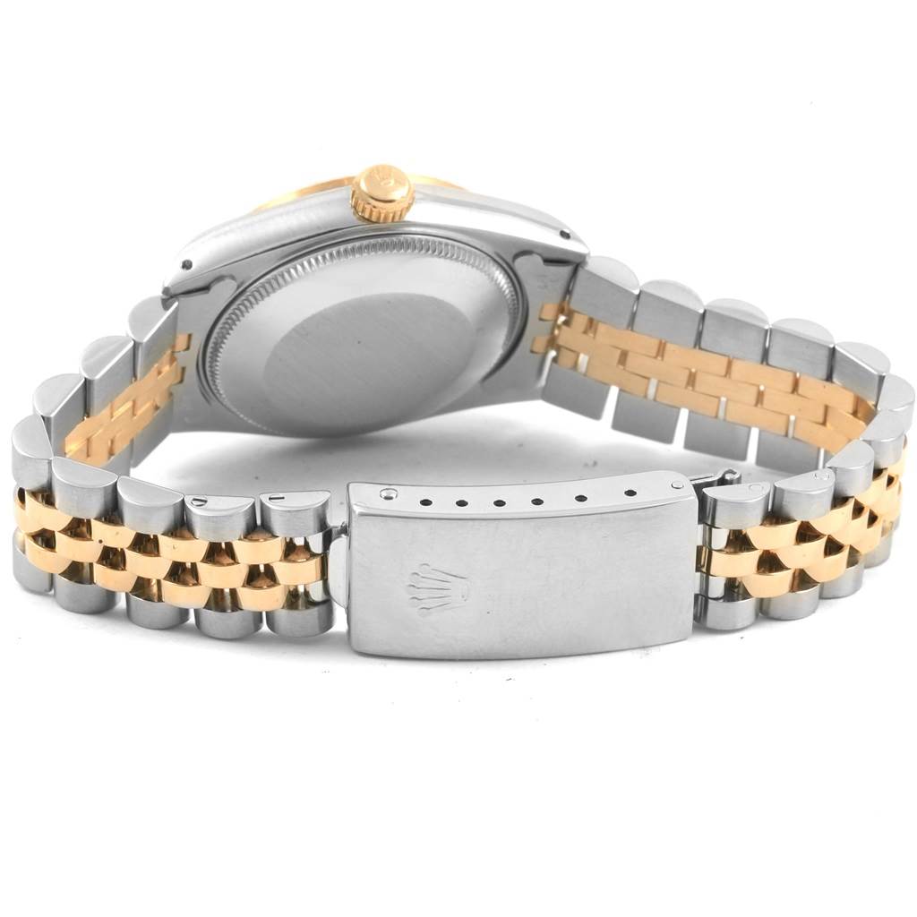 The image shows the rear view of a Rolex Mid-Size 68273 Women's Steel and Gold (two tone) Champagne Dial 68273 Women's Steel and Gold (two tone) Champagne Dial watch focusing on the case back, crown, and two-tone jubilee bracelet with the clasp.
