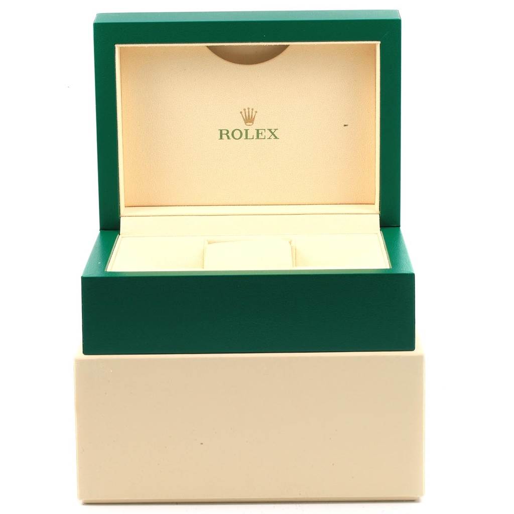 The image shows an open green and cream-colored Rolex watch box for the Mid-Size model.
