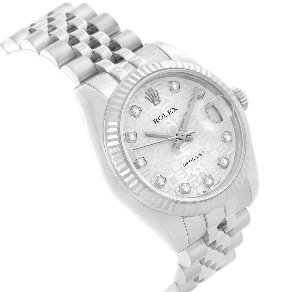 The image shows a Rolex Datejust Mid-Size watch from an angled top view, highlighting the dial, bezel, and bracelet.