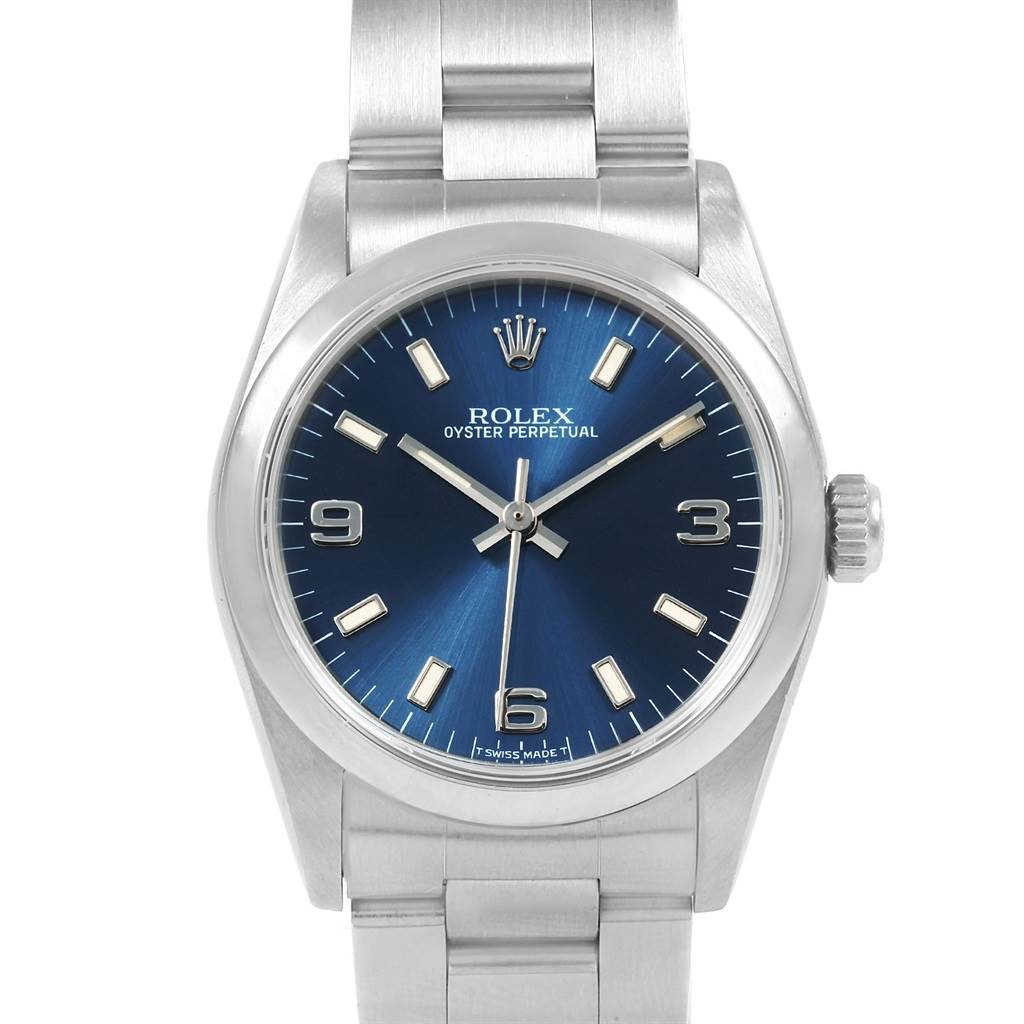 This image shows a front view of a Rolex Mid-Size 67480 Women's Stainless Steel Blue Dial 67480 Women's Stainless Steel Blue Dial Oyster Perpetual watch with a blue dial and metal bracelet.