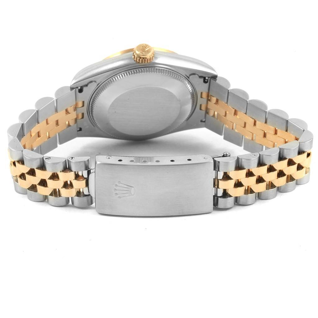 This image shows the back, clasp, and bracelet of a Rolex Mid-Size 68273 Women's Steel and Gold (two tone) Silver Dial 68273 Women's Steel and Gold (two tone) Silver Dial watch, highlighting its two-tone metal design.