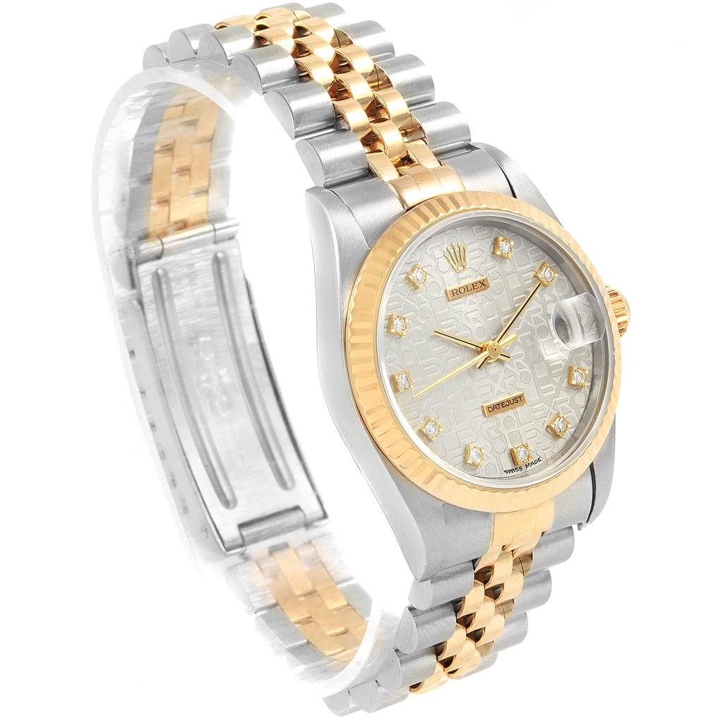 The image shows a Rolex Mid-Size 68273 Women's Steel and Gold (two tone) Silver Dial 68273 Women's Steel and Gold (two tone) Silver Dial Datejust watch from a three-quarter angle, highlighting its face, two-tone bracelet, and side profile.