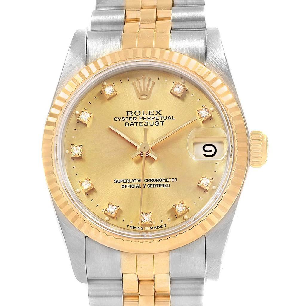 The image shows a Rolex Mid-Size 68273 Women's Steel and Gold (two tone) Champagne Dial 68273 Women's Steel and Gold (two tone) Champagne Dial Datejust watch from a front angle, featuring a gold and silver bracelet, diamond markers, and a date display.