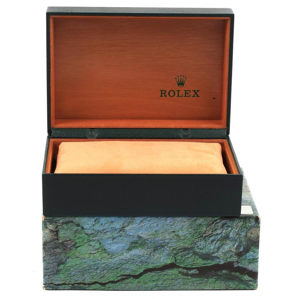 The image shows an open Rolex Mid-Size 68273 Women's Steel and Gold (two tone) Champagne Dial 68273 Women's Steel and Gold (two tone) Champagne Dial model watch box with padding inside, viewed from the front.