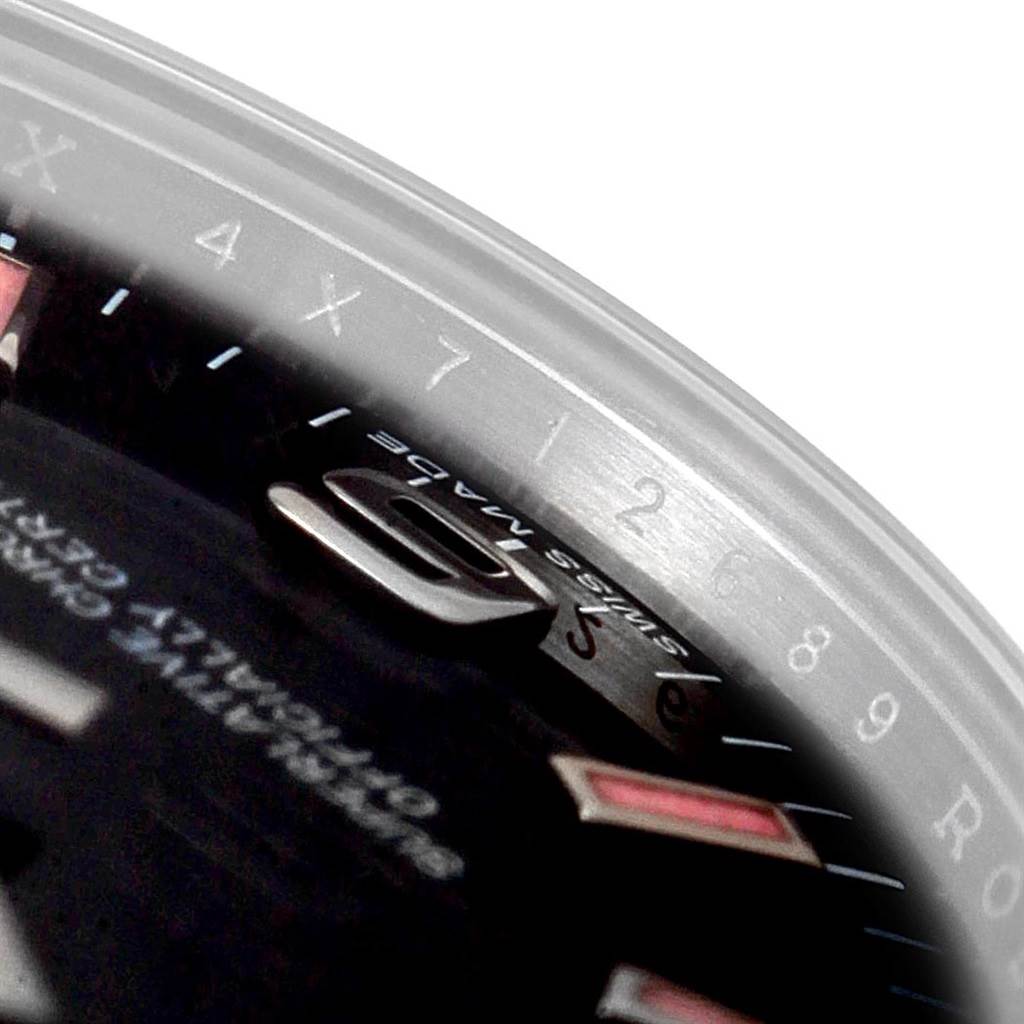 The image shows a close-up angle of the dial and part of the bezel of a Mid-Size Rolex watch.