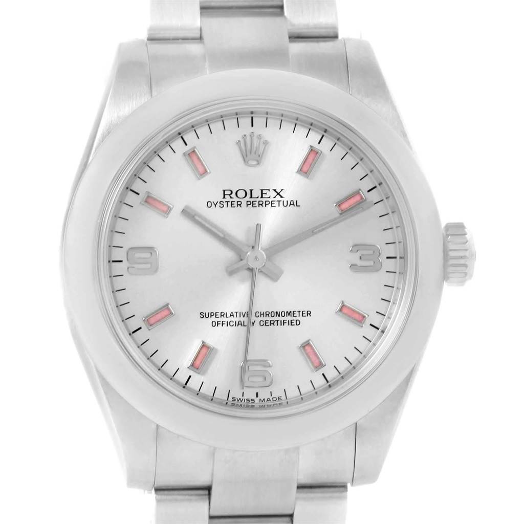 This image shows a frontal view of a Rolex Oyster Perpetual Mid-Size model, including its dial, hands, crown, and part of the bracelet.