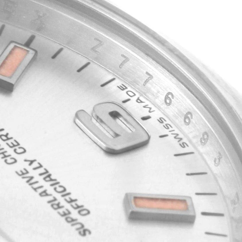 This close-up image shows the dial and hour markers of a Rolex Mid-Size 177200 Women's Stainless Steel Silver Dial 177200 Women's Stainless Steel Silver Dial watch at an angle.