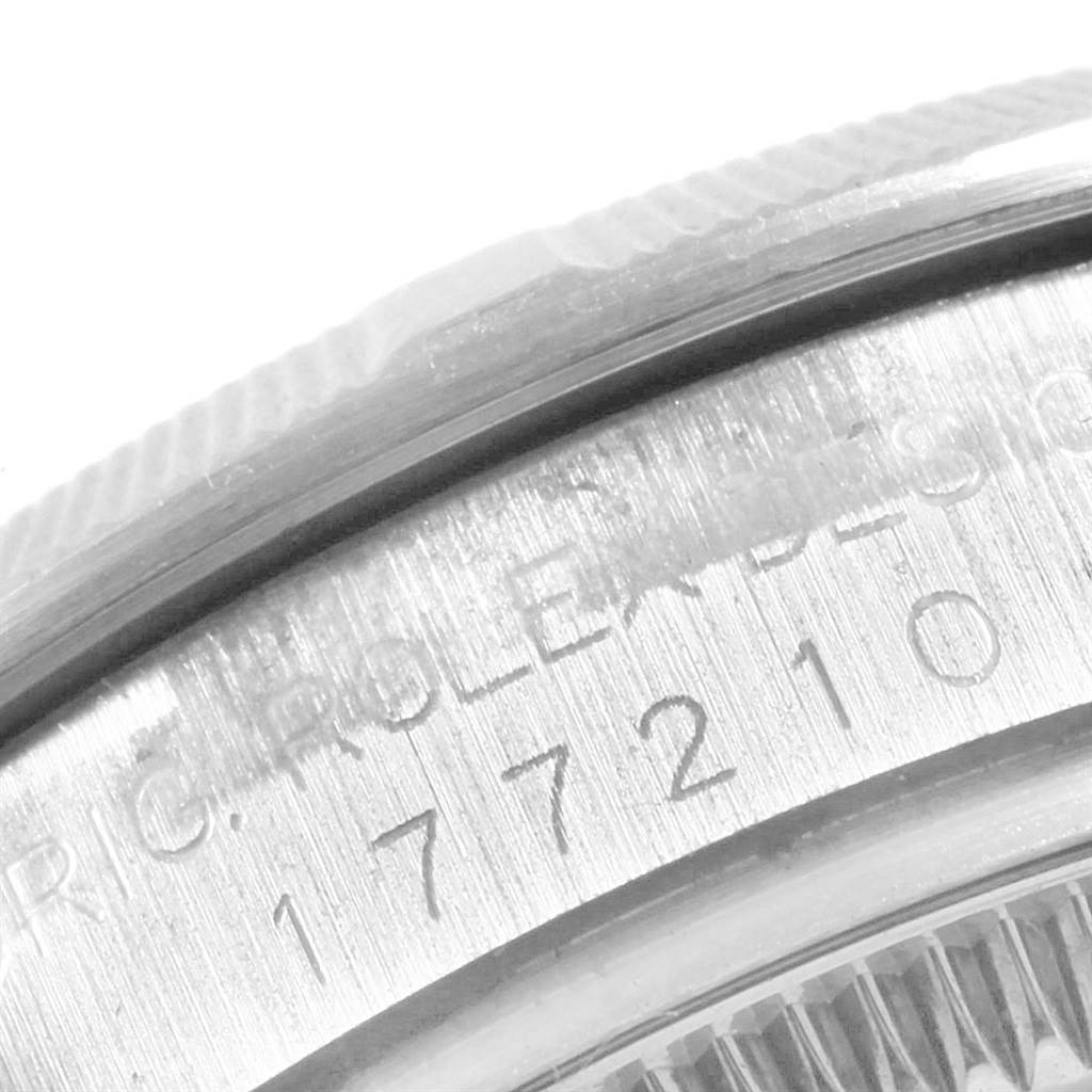 The image shows a close-up of the engraved serial number and model details on the side of a Rolex Mid-Size 177210 Women's Stainless Steel Silver Dial 177210 Women's Stainless Steel Silver Dial watch.