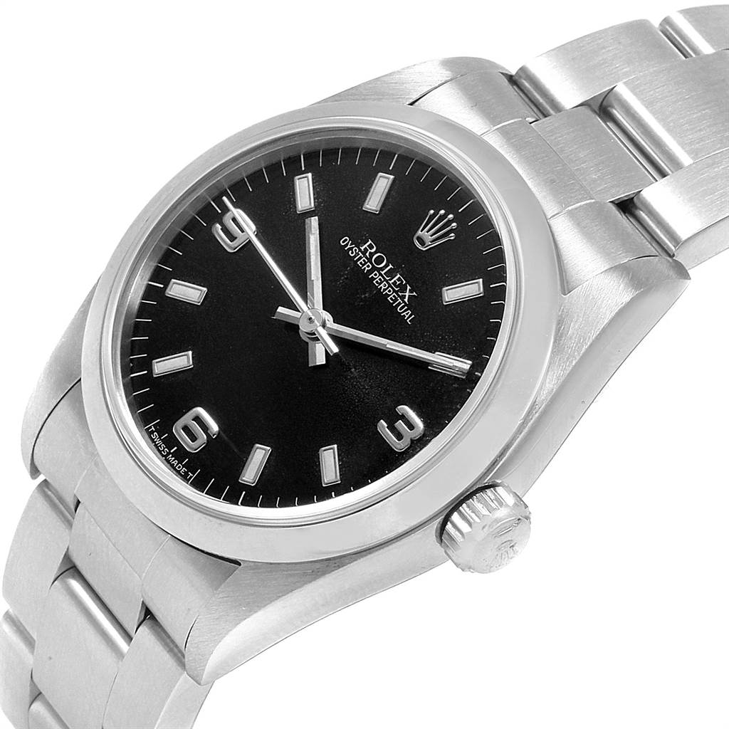 The Rolex Mid-Size 67480 Women's Stainless Steel Black Dial 67480 Women's Stainless Steel Black Dial Oyster Perpetual watch is shown at an angled view, displaying the face, crown, and part of the bracelet.