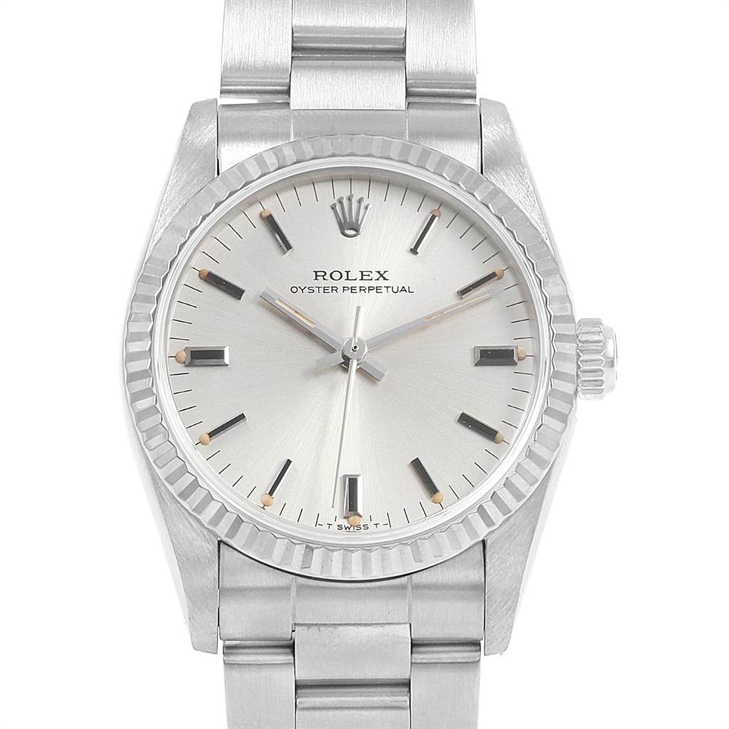 The image shows a Mid-Size Rolex Oyster Perpetual watch from a front angle, displaying the dial, bezel, crown, and bracelet.