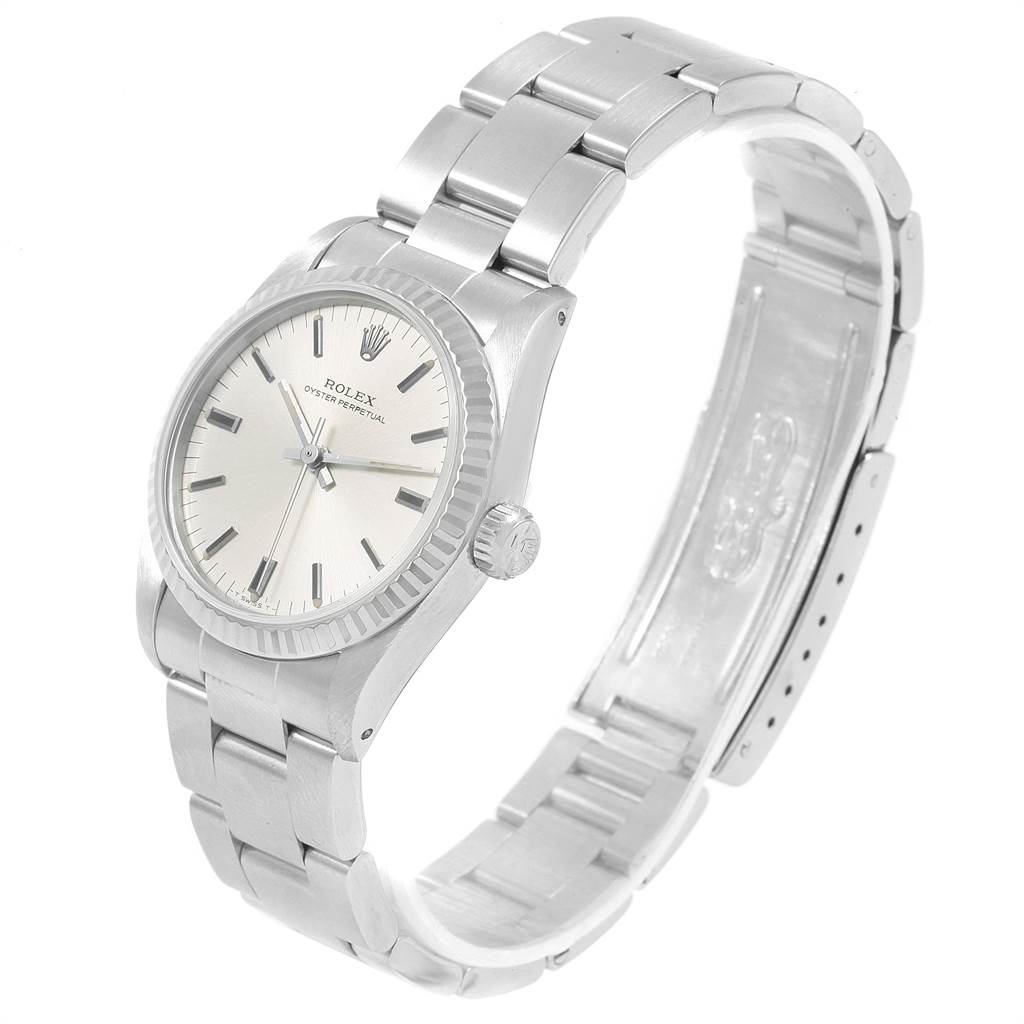 This image shows a side angle of the Rolex Mid-Size 67514 Women's Stainless Steel Silver Dial 67514 Women's Stainless Steel Silver Dial model, displaying the watch face and the full bracelet.