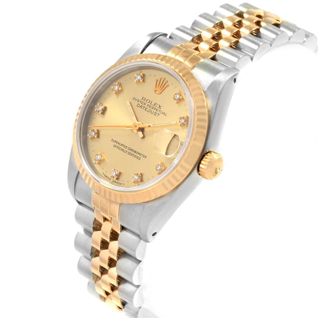 The image shows a Rolex Mid-Size 68273 Women's Steel and Gold (two tone) Champagne Dial 68273 Women's Steel and Gold (two tone) Champagne Dial Datejust watch at an angle displaying the face, bezel, crown, and part of the bracelet.