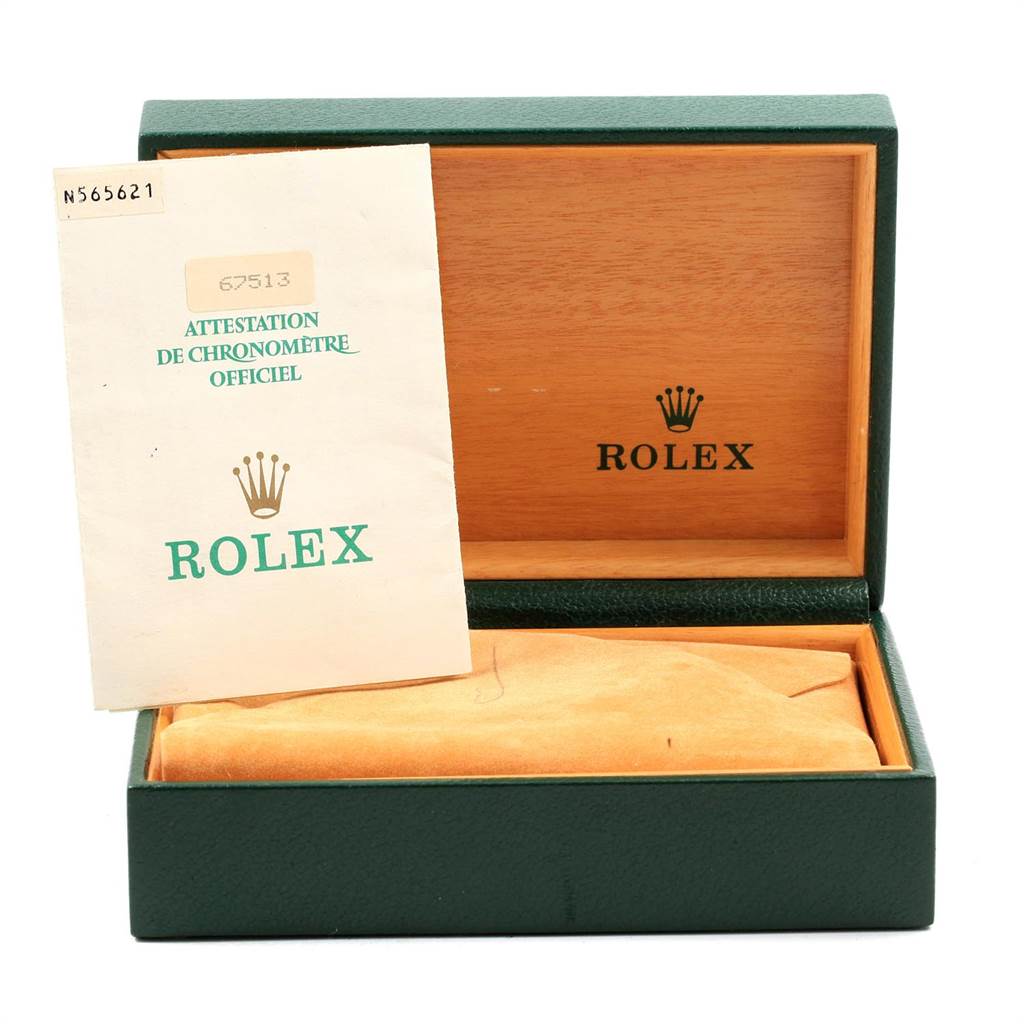 The image shows the opened box and certificate for a Mid-Size Rolex watch model.