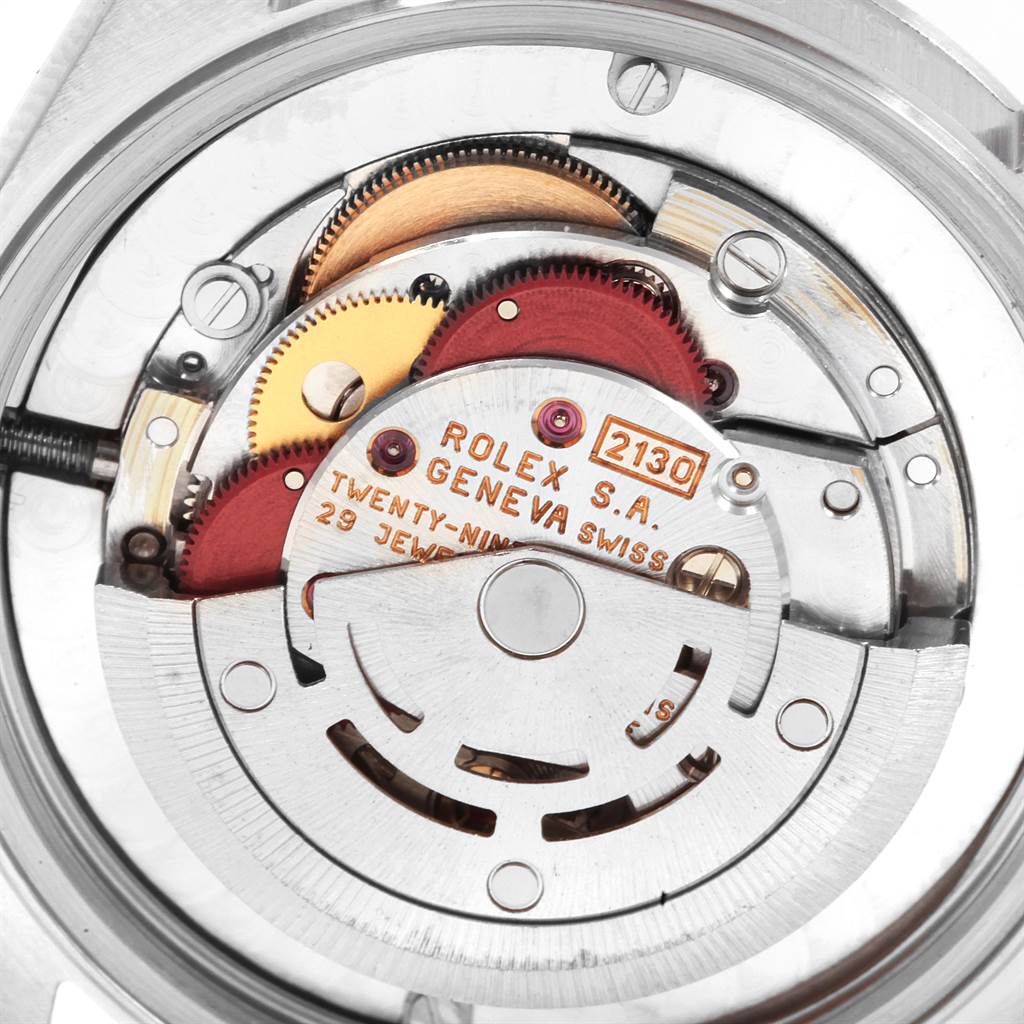 This is an internal view angle showing detailed mechanisms of the Rolex Mid-Size 67480 Women's Stainless Steel White Dial 67480 Women's Stainless Steel White Dial model.