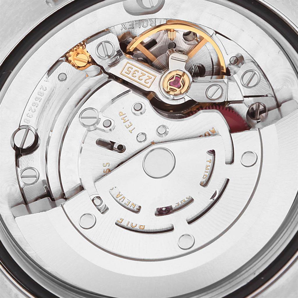 This image shows the intricate inner mechanical movement of a Rolex Mid-Size 178341 Women's Steel and Gold (two tone) Pink Dial 178341 Women's Steel and Gold (two tone) Pink Dial watch from a close-up angle.
