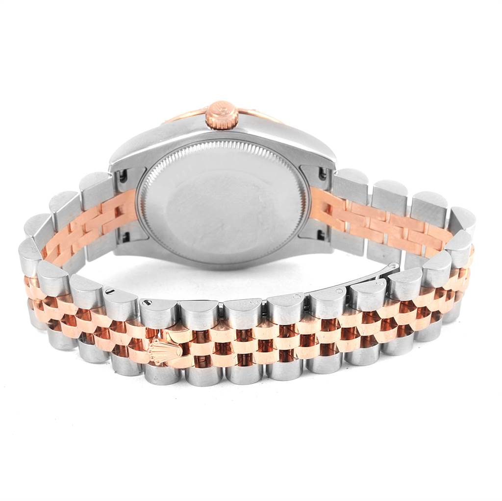 This Rolex Mid-Size 178341 Women's Steel and Gold (two tone) Pink Dial 178341 Women's Steel and Gold (two tone) Pink Dial model watch is shown from the back, displaying its case back and Jubilee two-tone bracelet.