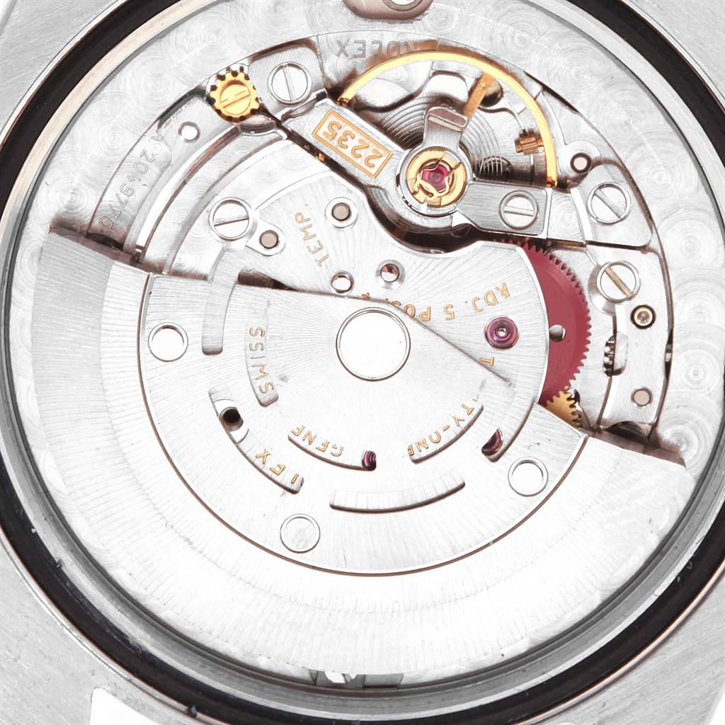 This image shows the detailed internal movement and mechanism of a Rolex Mid-Size 178274 Women's Stainless Steel Mother of Pearl Dial 178274 Women's Stainless Steel Mother of Pearl Dial watch model 2235 from a top-down angle.