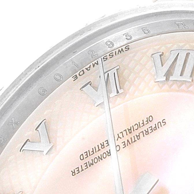 The image shows a close-up of the dial and bezel of a Rolex Mid-Size 178274 Women's Stainless Steel Mother of Pearl Dial 178274 Women's Stainless Steel Mother of Pearl Dial watch, focusing on Roman numerals and the text 'Swiss Made.'