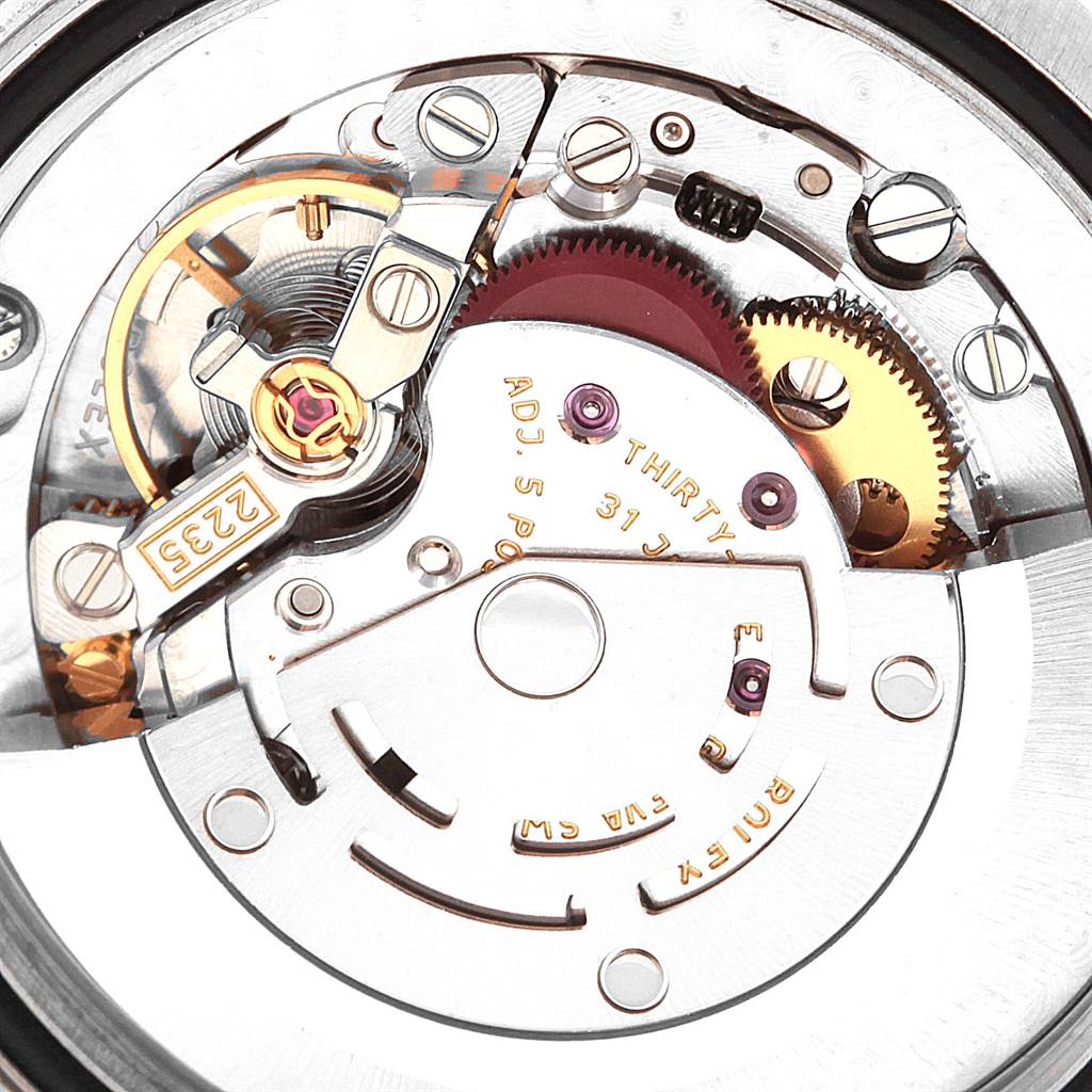 The image shows a close-up of the internal movement parts of a Rolex Mid-Size 178344 Women
s Stainless Steel Brown Dial 178344 Women
s Stainless Steel Brown Dial model watch.