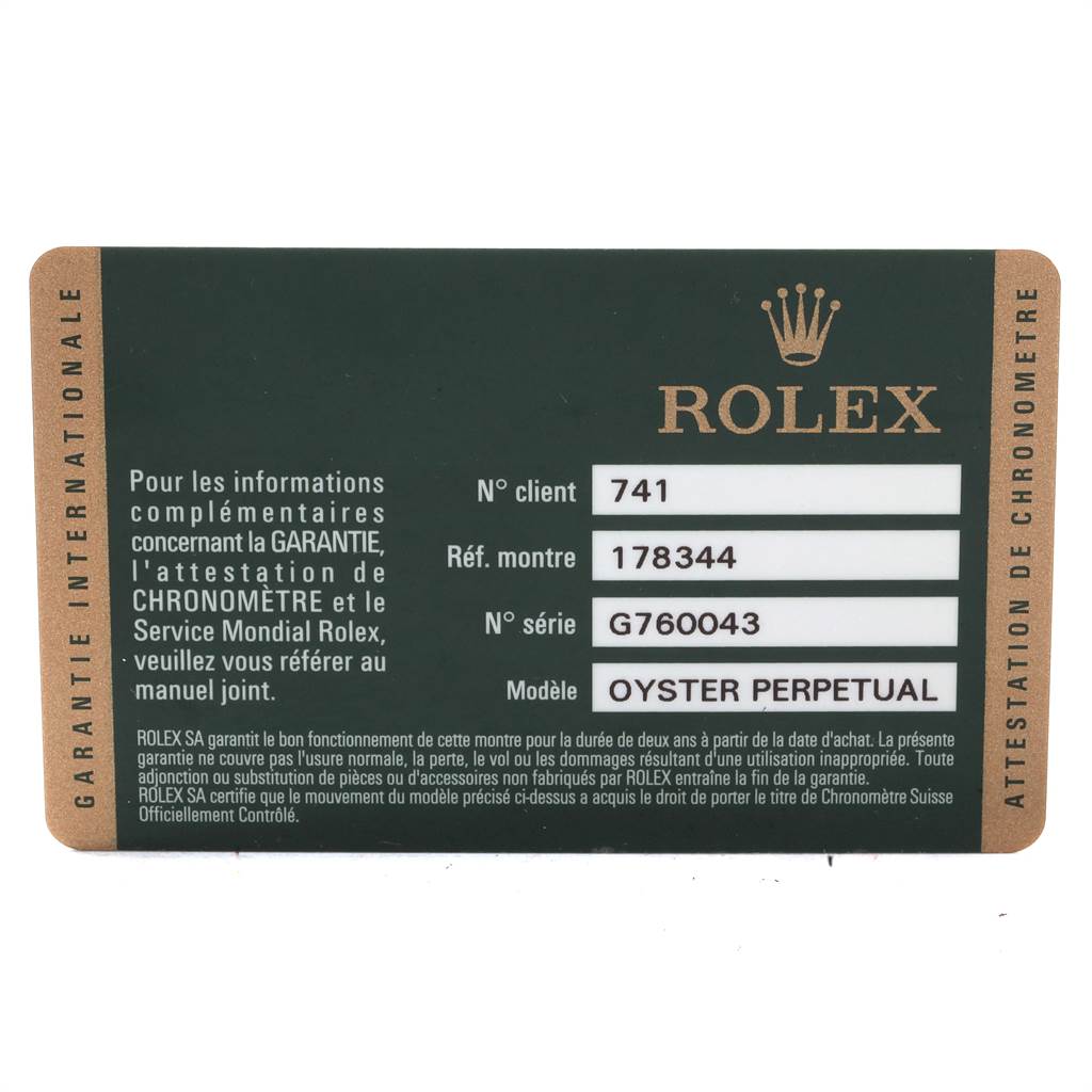 This image shows a Rolex warranty card for the Mid-Size Rolex Oyster Perpetual model, including client, reference, and serial numbers.