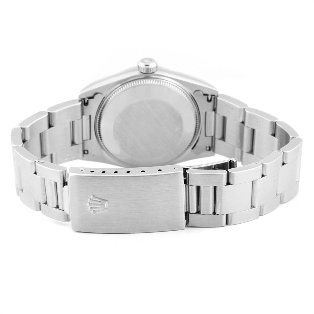 The image shows the back view of a Rolex Mid-Size 77080 Women's Stainless Steel Black Dial 77080 Women's Stainless Steel Black Dial watch, highlighting the clasp and bracelet.