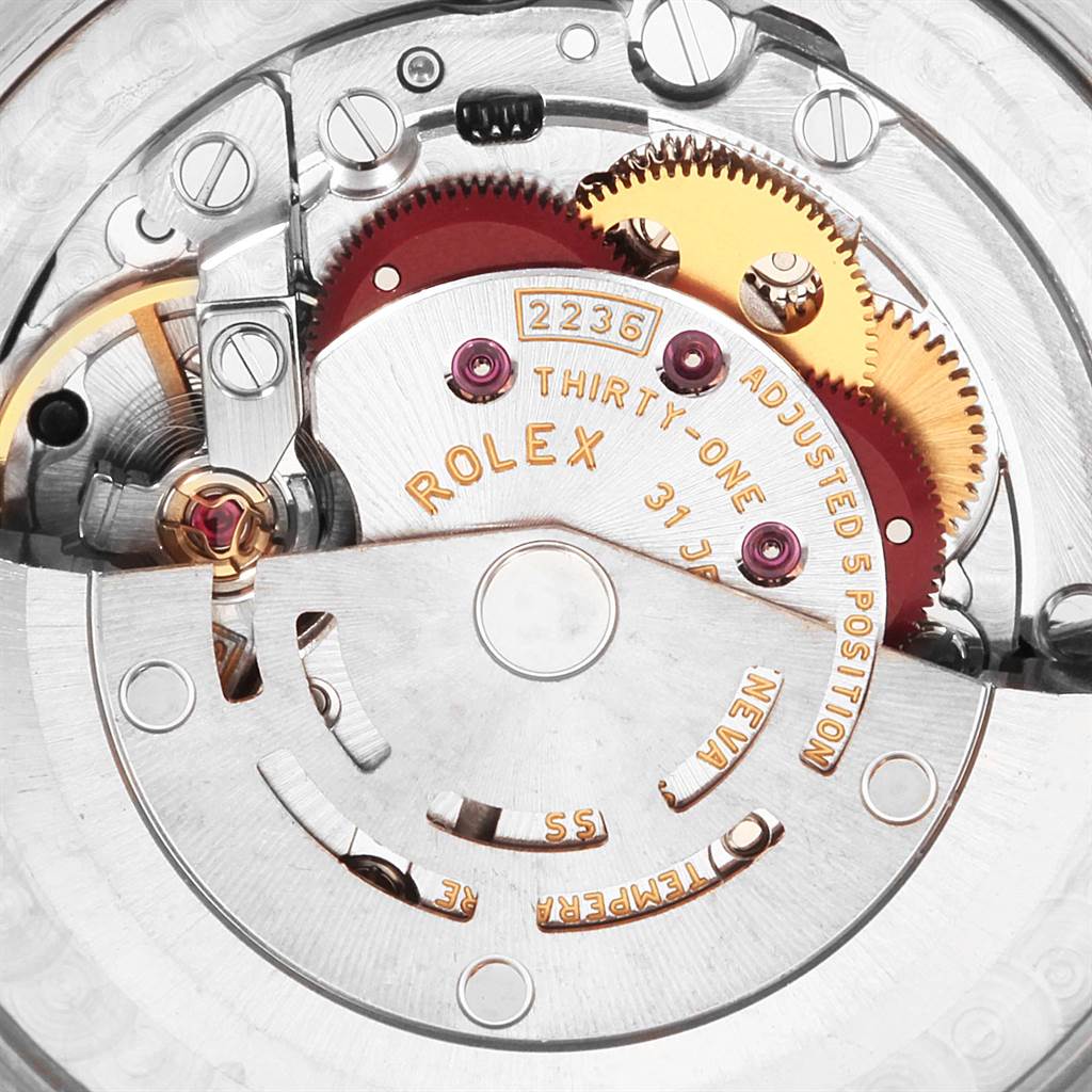 This image shows the internal movement mechanism of a Rolex Mid-Size 77080 Women's Stainless Steel Black Dial 77080 Women's Stainless Steel Black Dial model watch from a close-up angle.