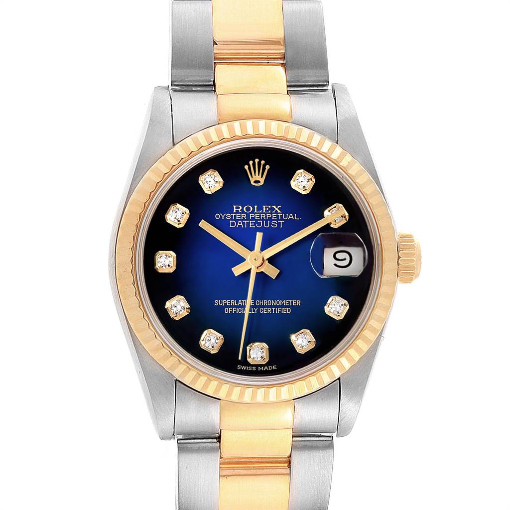 This is a front view of the Rolex Mid-Size 68273 Women's Steel and Gold (two tone) Blue Dial 68273 Women's Steel and Gold (two tone) Blue Dial Oyster Perpetual Datejust watch, featuring its face, bezel, and part of the band.