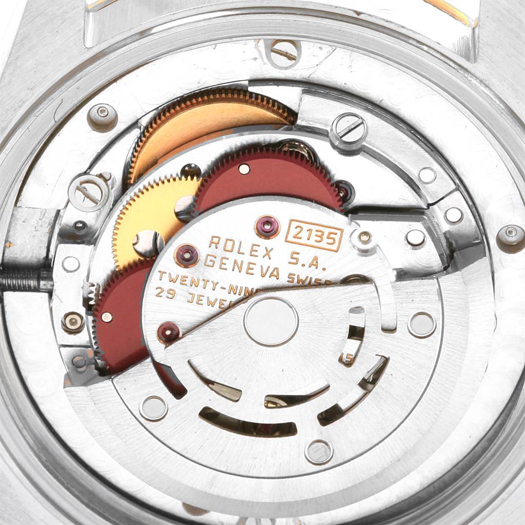 The image shows the internal movement mechanism of a Rolex Mid-Size 68273 Women's Steel and Gold (two tone) Blue Dial 68273 Women's Steel and Gold (two tone) Blue Dial watch from a back angle.