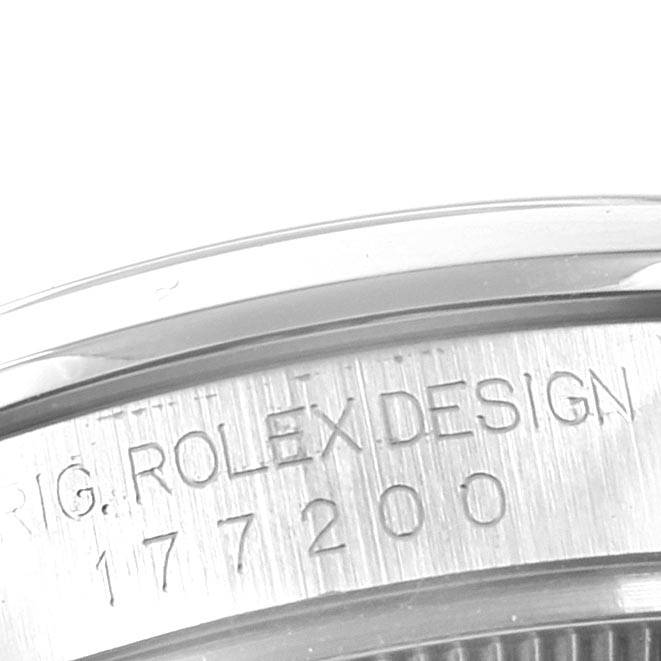 The image shows a close-up of the side of a mid-size Rolex watch, focusing on the engraved "ROLEX DESIGN" and model number 177200.