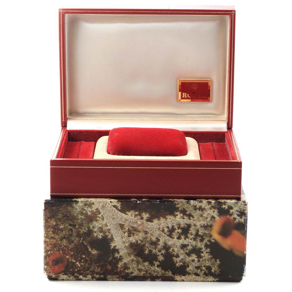 The image shows an open red watch box for a Mid-Size Rolex, displaying its interior with a compartmentalized cushion.