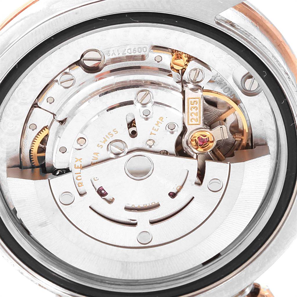 This image shows the internal mechanism of a Rolex Mid-Size 178341 Women's Steel and Gold (two tone) Black Dial 178341 Women's Steel and Gold (two tone) Black Dial model watch, highlighting its movement and intricate components.