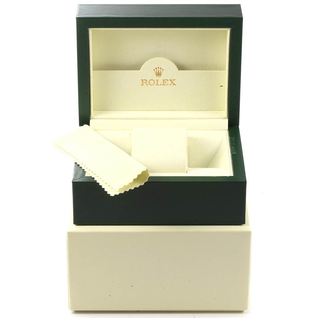 This image shows an open Rolex watch box with a cleaning cloth and cushion for a Mid-Size model.