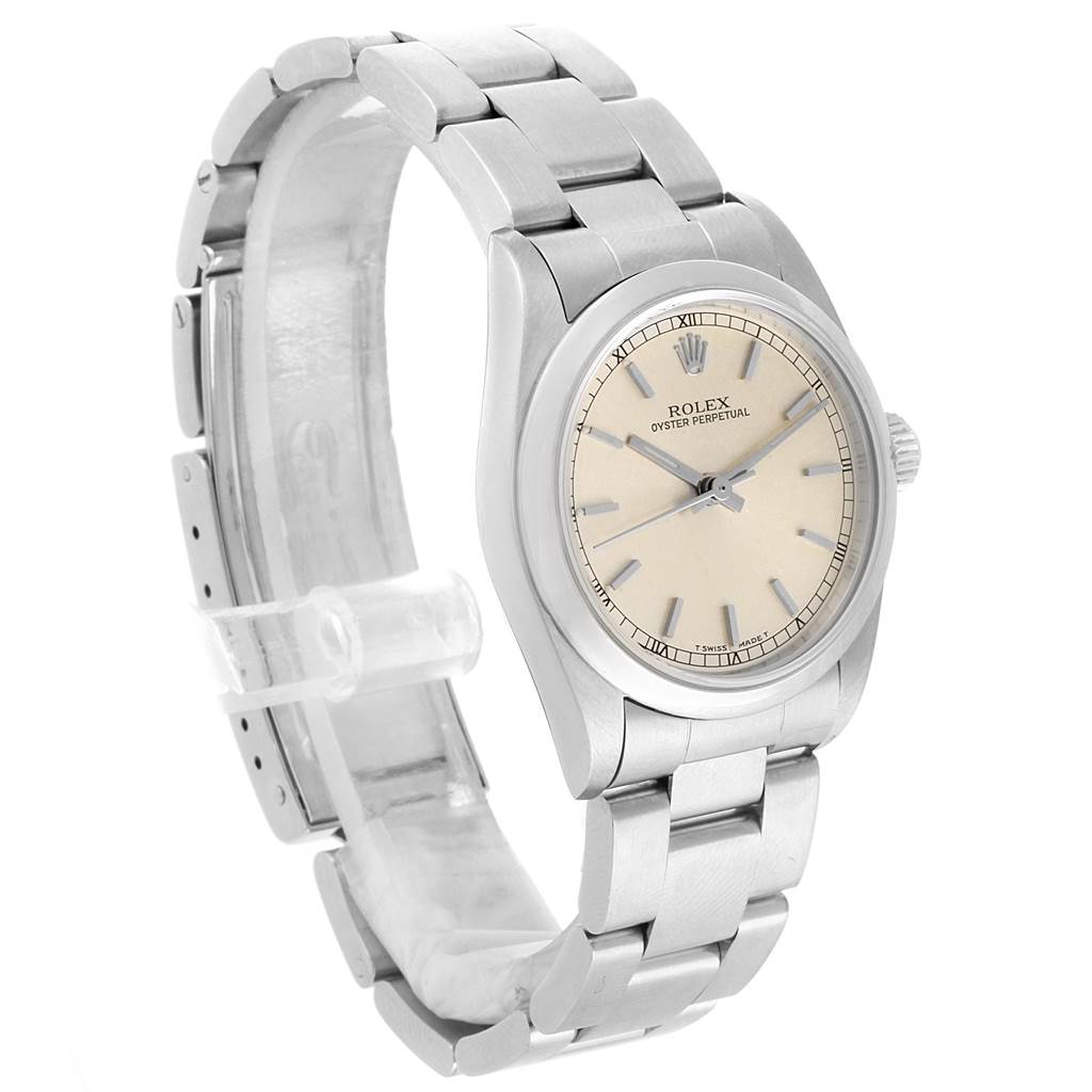 The image shows a Rolex Mid-Size 77080 Women's Stainless Steel Silver Dial 77080 Women's Stainless Steel Silver Dial Oyster Perpetual watch at a three-quarter angle, displaying its face, bezel, and bracelet.