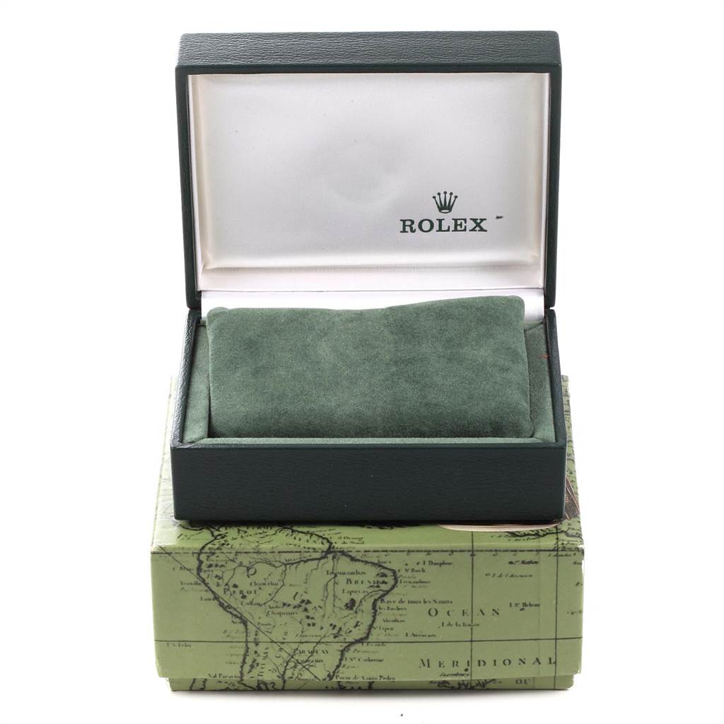 This image shows an open green Rolex box with an inner green cushion, designed for a Rolex Mid-Size 77080 Women's Stainless Steel Silver Dial 77080 Women's Stainless Steel Silver Dial model watch.